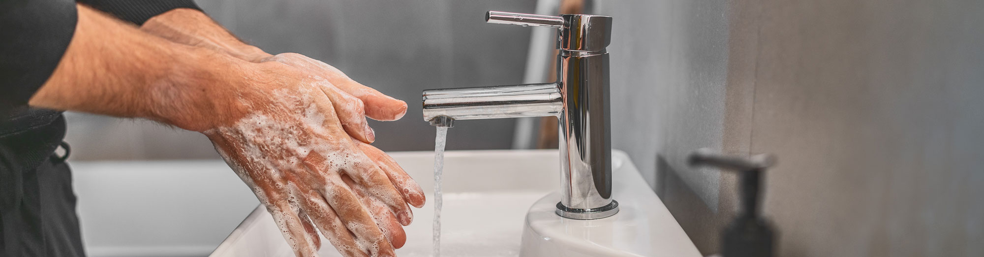 Coronavirus travel prevention wash hands with soap and hot water